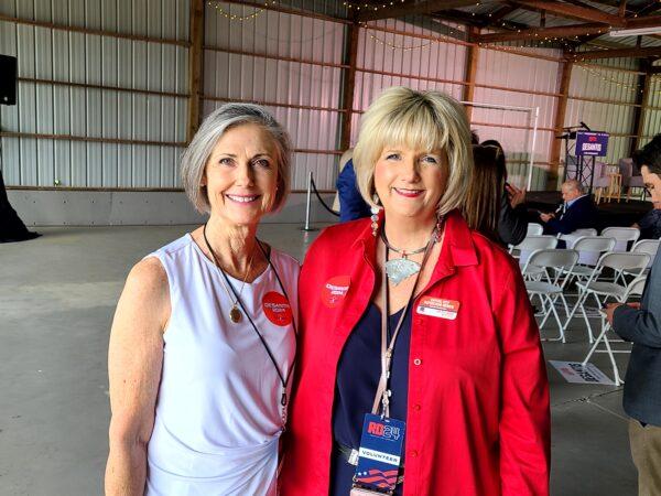 Kim Demer (L) and Deb Dollarhide help prepare for the arrival of Florida Gov. Ron DeSantis at his campaign stop in Gilbert, S.C., on June 2, 2023. (Dan M. Berger/The Epoch Times)