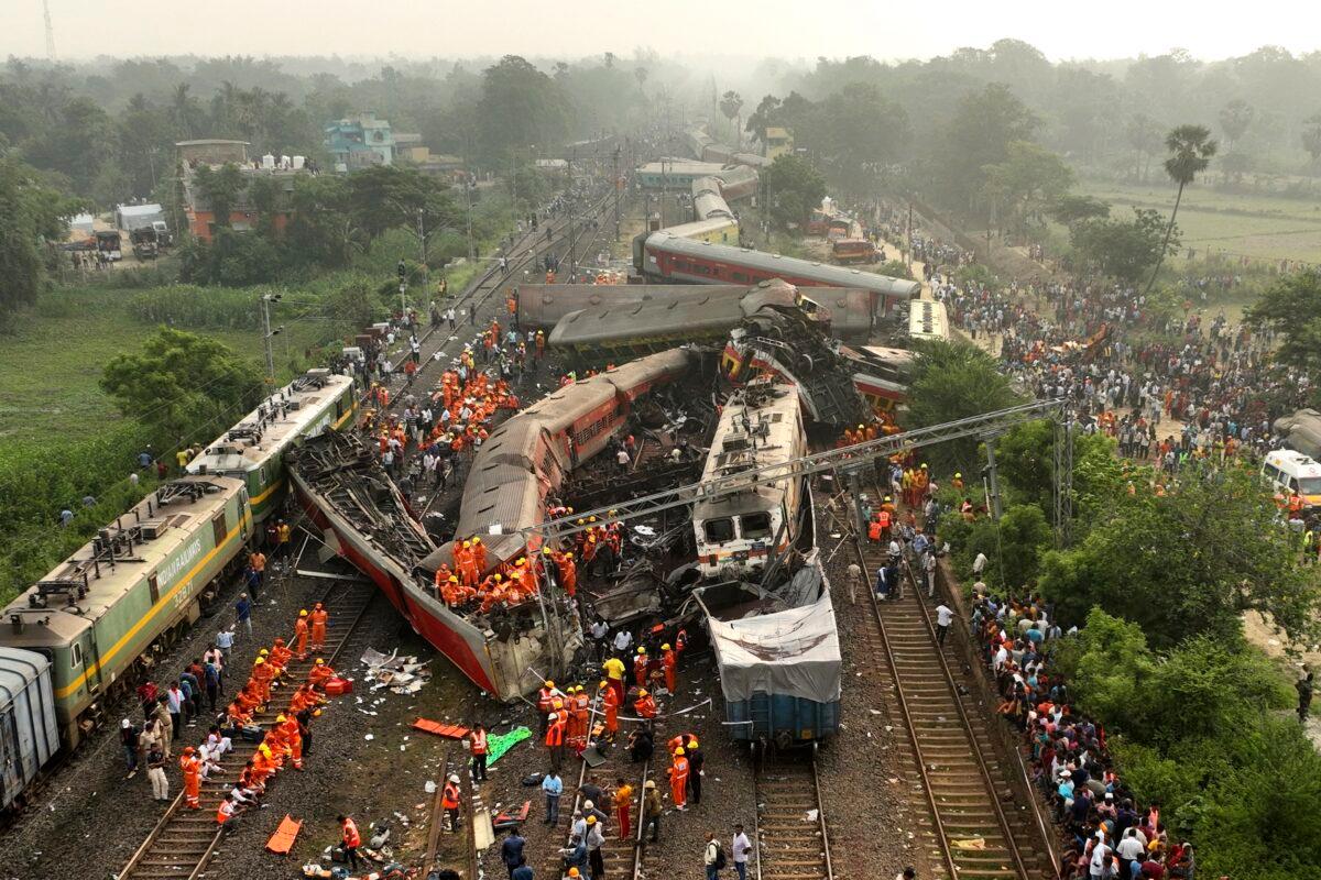 Rescuers work at the site of passenger trains accident in Balasore district, eastern Indian state of Orissa, on June 3, 2023. (Arabinda Mahapatra/AP Photo)