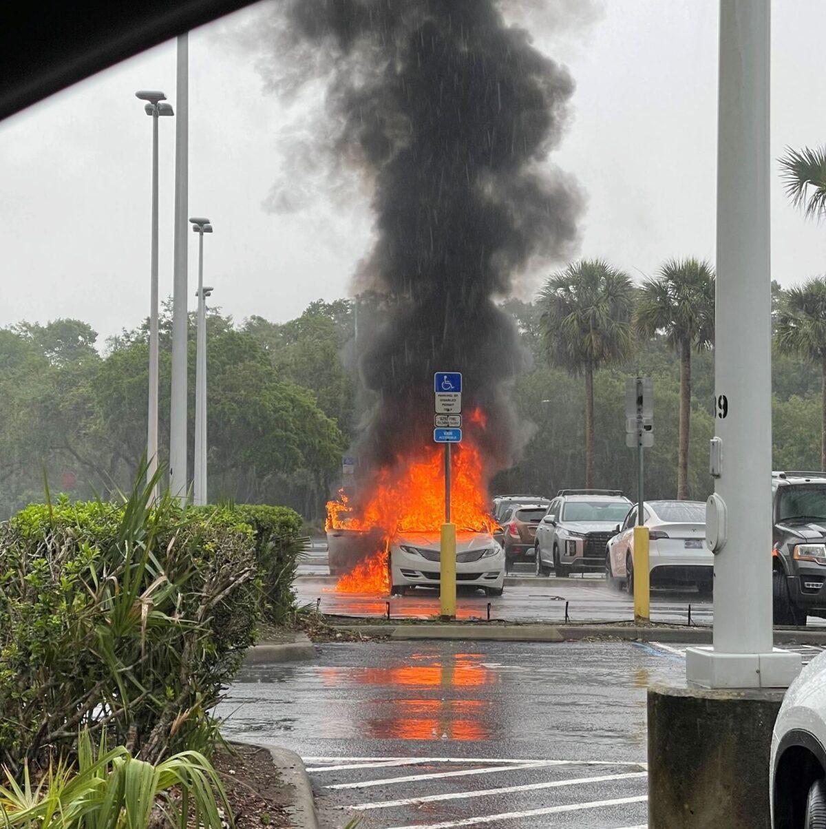 A burning vehicle outside the Oviedo Mall, in Oviedo, Fla., on May 26, 2023. (Courtesy of Oviedo Police Department)
