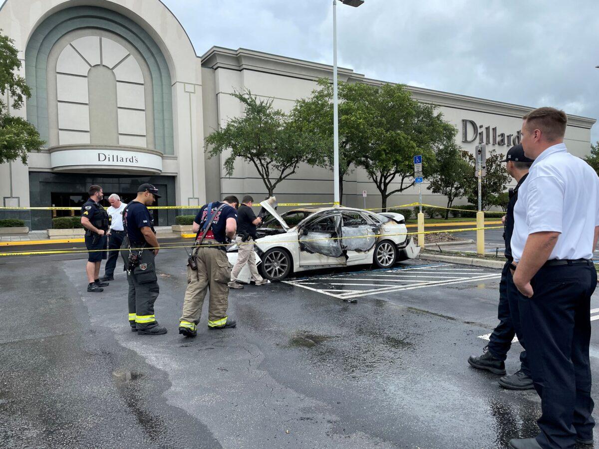 Emergency crews on the scene of a car that caught fire outside the Oviedo Mall, in Oviedo, Fla., on May 26, 2023. (Oviedo Police Department)
