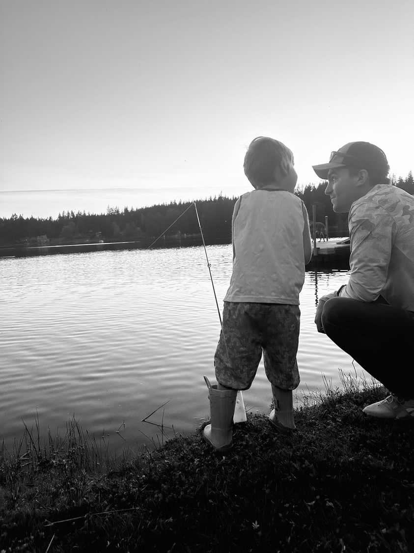 Branson with his father by the lake on the day of his homecoming surprise. (Courtesy of Kelsi Westbrook)