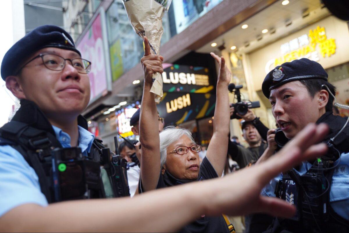 On the 34th anniversary of the Tiananmen Square Massacre, well-known Hongkonger Alexandra Wong Fung-yiu, also known as "Grandma Wong," was taken away by the Hong Kong Police in Hong Kong on June 4, 2023. (Benson Lau/The Epoch Times)
