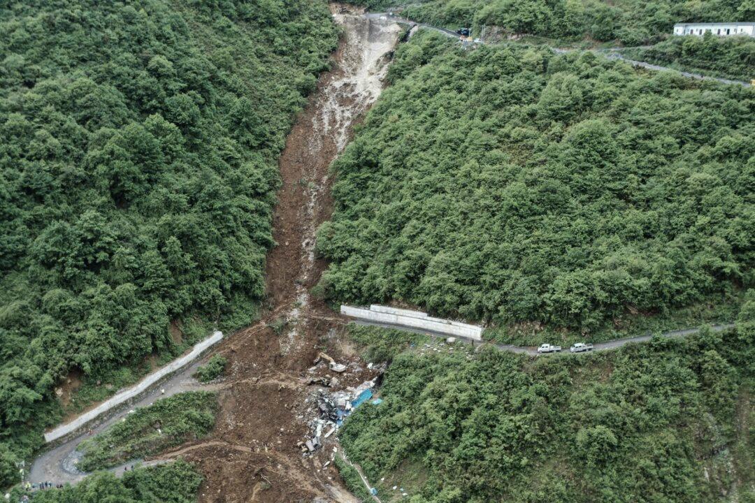 At Least 19 Killed in Southwest China Landslide Covering Mine Worker Dormitory
