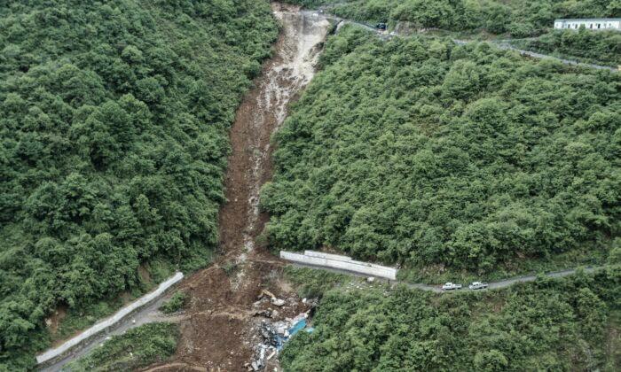 At Least 19 Killed in Southwest China Landslide Covering Mine Worker Dormitory