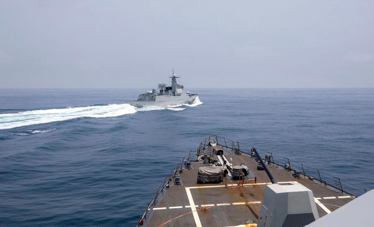 A Chinese navy ship conducts what U.S. officials called an "unsafe” maneuver, cutting sharply across the path of a U.S. destroyer in the Taiwan Strait, on June 3, 2023. (Mass Communication Specialist 1st Class Andre T. Richard/U.S. Navy via AP)