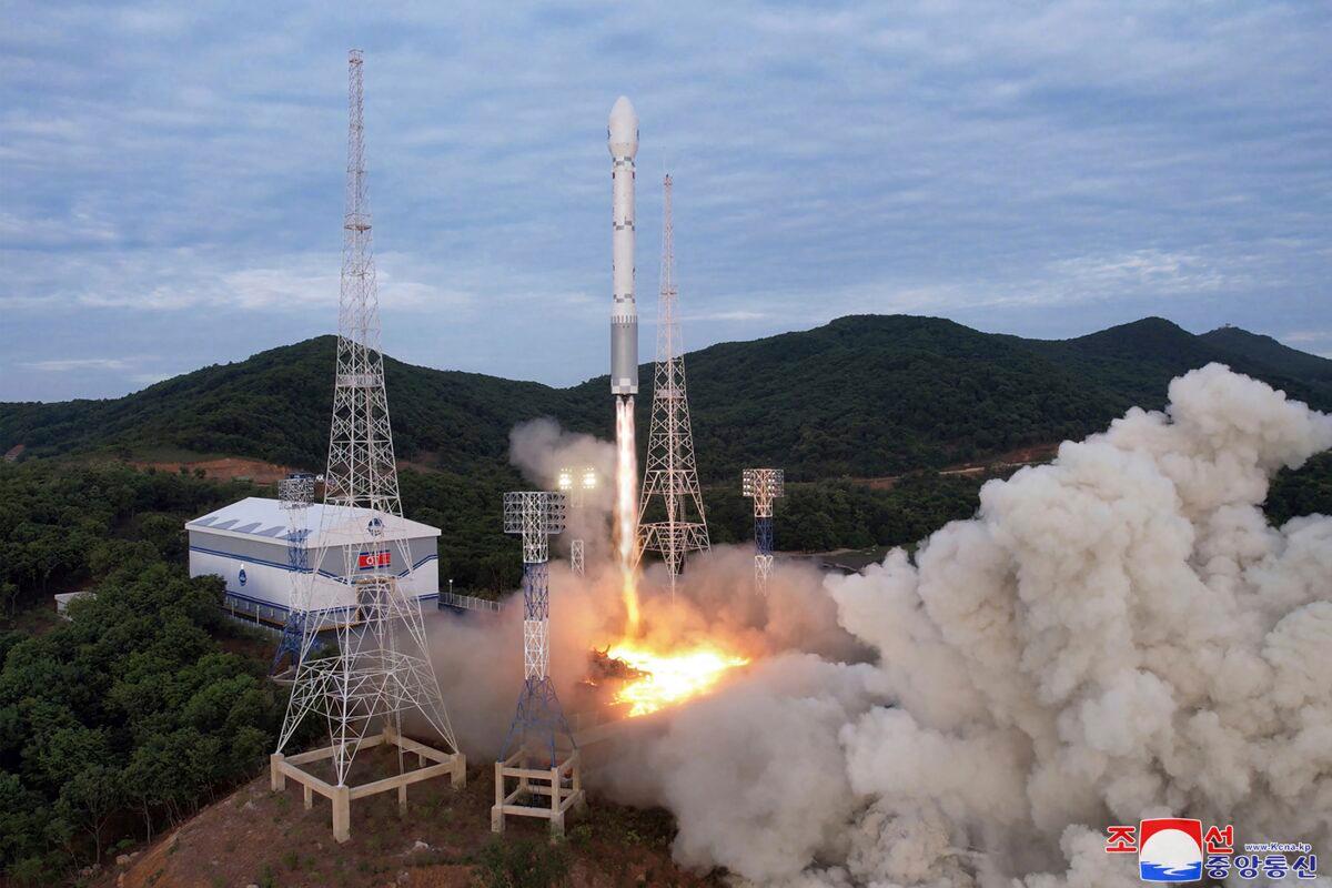 This photo provided by the North Korean regime shows what it says is a launch of the newly developed Chollima-1 rocket carrying the Malligyong-1 satellite at the Sohae Satellite Launching Ground in Tongch'ang-ri, North Korea, on May 31, 2023. (Korean Central News Agency/Korea News Service via AP)