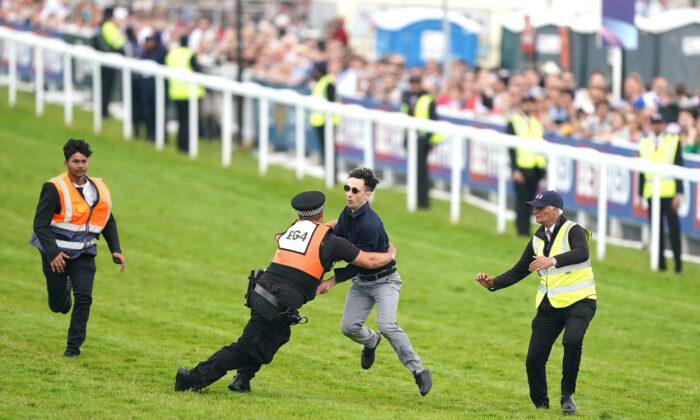 Animal Rights Protester Charged After Running Onto Epsom Racecourse