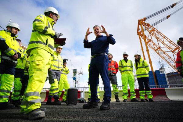 Labour leader Sir Keir Starmer talks to workers during a visit to Hinkley Point C nuclear power station in Somerset, England, on June 5, 2023. (Ben Birchall/PA Media)