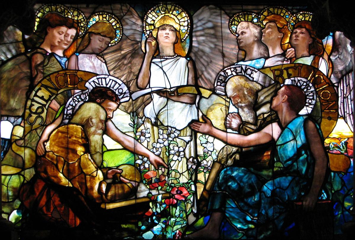 The balance between "mythos" and "logos" with science and faith harmoniously presided over by the personification of "Light, Love, and Life." Central panel of "Education," 1890, by Louis Comfort Tiffany. Stained glass window in Linsly-Chittenden Hall, Yale University. (Public Domain)