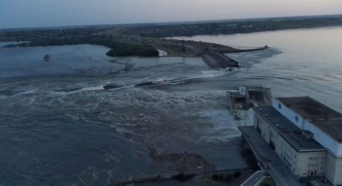A general view of the Nova Kakhovka dam that was breached in Kherson region, Ukraine, on June 6, 2023 in this screen grab taken from a video. (Reuters)