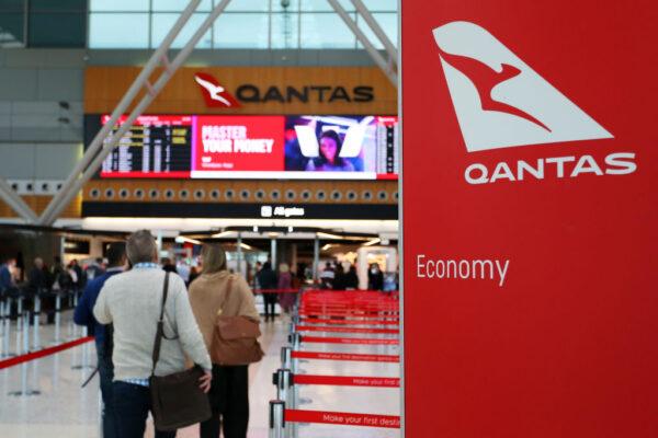 People arrive at the Qantas domestic terminal at Sydney Airport in Sydney, Australia, on Aug. 25, 2022. (Lisa Maree Williams/Getty Images)