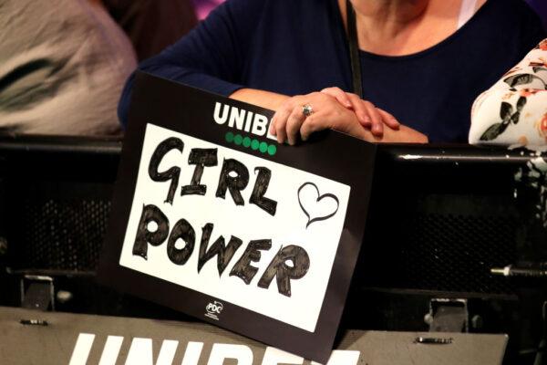 A fan shows a sign reading “Girl Power” during day two of the Unibet Premier League at Motorpoint Arena in Nottingham, England, on Feb. 13, 2020. (Alex Pantling/Getty Images)