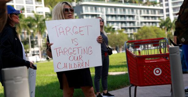 A woman protests outside of a Target store in Miami, Fla., on June 1, 2023. The protesters were objecting to “Pride Month” merchandise at Target. (Joe Raedle/Getty Images)