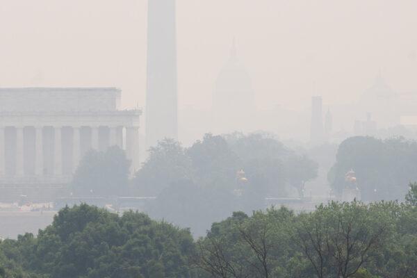 A haze from wildfires in Canada settles over the Lincoln Memorial and Washington Monument on the National Mall in Washington on June 7, 2023. (Saul Loeb/AFP via Getty Images)