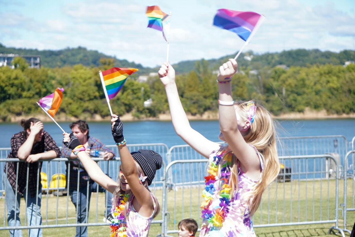 Children cheer as drag performers dance at the Chattanooga Pride parade in Chattanooga, Tenn., on Oct. 2, 2022. (Jackson Elliott/The Epoch Times)