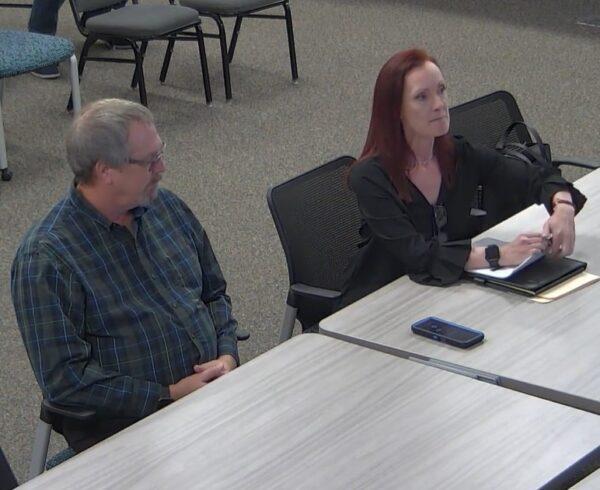 Cheryl Tristam (right) sitting with Flagler Youth Orchestra artistic director Joe Corporon, explains the structure of the orchestra program at the May 16, 2023, Flagler County School Board Workshop. (Screenshot/Flagler County Schools)