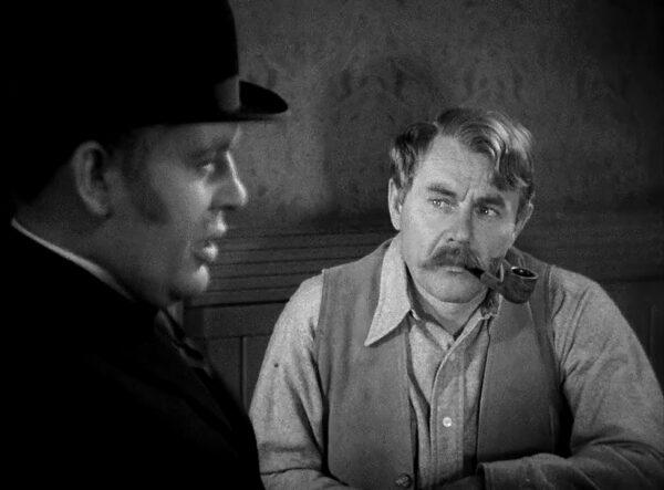 Marmaduke Ruggles (Charles Laughton, L) recites the Gettysburg Address as Egbert Floud (Charles Ruggles) listens, in "The Ruggles of Red Gap." (Paramount Pictures)
