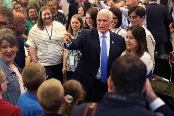 Former Vice President Mike Pence, joined by his wife Karen, greets supporters after formally announcing his intention to seek the Republican nomination for president in Ankeny, Iowa, on June 7, 2023. (Scott Olson/Getty Images)