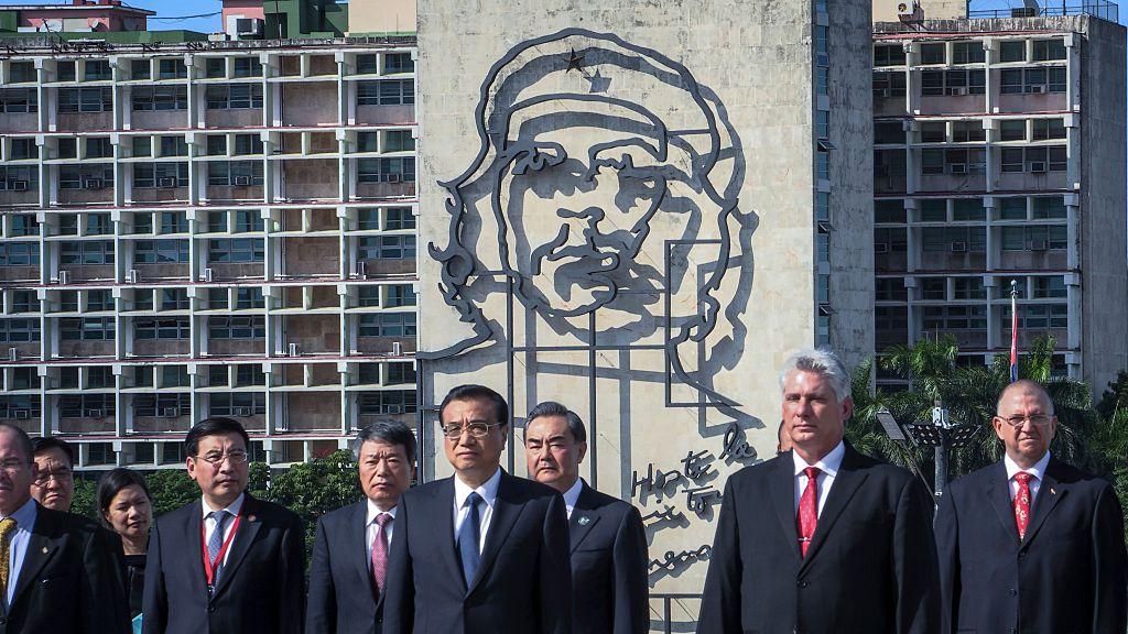 Chinese Premier Li Keqiang (fore, left) standing next to first Cuban Vice President Miguel Diaz Canel (fore, right) at a wreath-laying ceremony at the Jose Marti monument in Revolution Square of Havana on Sept. 24, 2016. (Adalberto Roque/AFP via Getty Images)