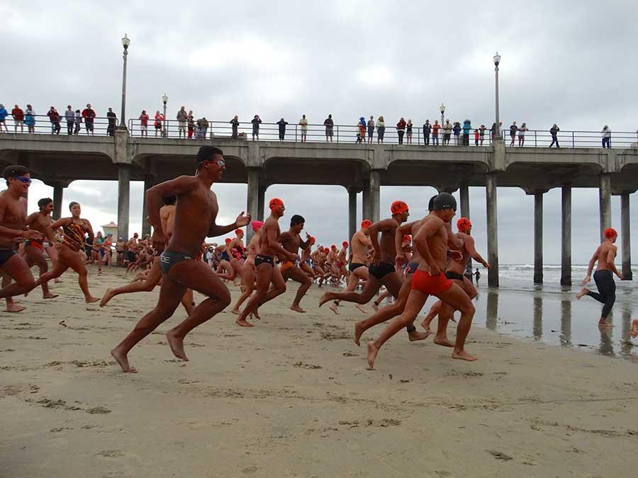 Participants compete in the Huntington Beach Annual Pier Swim. (Courtesy of City of Huntington Beach)