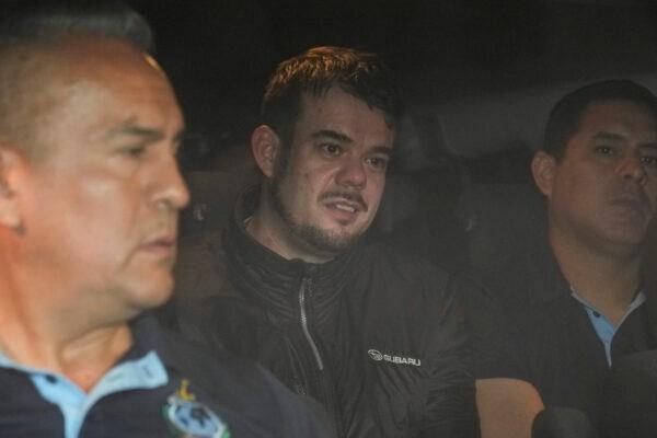 Dutch citizen Joran van der Sloot is driven in a police vehicle from the Ancon I maximum-security prison, outskirts of Lima, Peru, on June 8, 2023. (Martin Mejia/AP Photo)