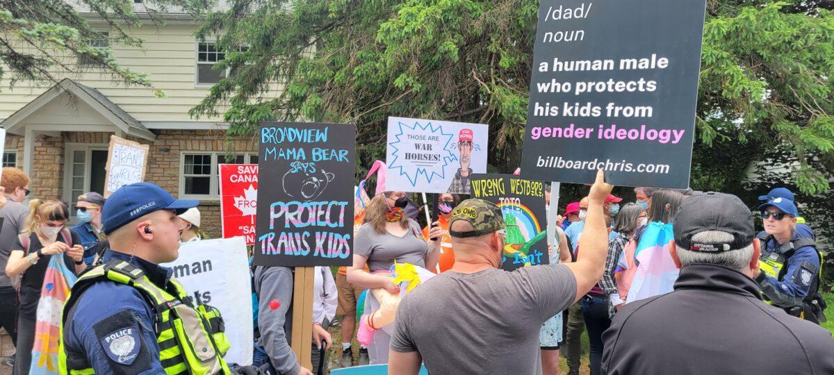 Hundreds of protesters and counter-protesters gather in Ottawa's west end to clash over gender ideology being taught in schools. (Matthew Horwood/The Epoch Times)
