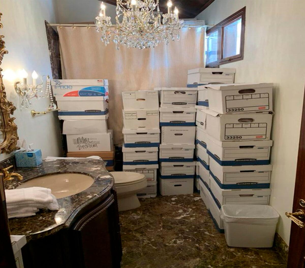 This image, contained in the indictment against former President Donald Trump, shows boxes of records stored in a bathroom at Trump's Mar-a-Lago estate in Palm Beach, Fla. (Department of Justice via AP)