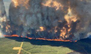 Eyes on the Weather as Residents Pack and Flee From Fierce Wildfire in Northeast BC