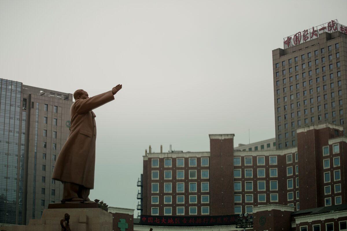 A statue of late communist leader Mao Zedong facing the First Hospital of China Medical University where China's Nobel laureate Liu Xiaobo is being held inside, in Shenyan, Liaoning province, on July 13, 2017. (Fred Dufour/AFP via Getty Images)