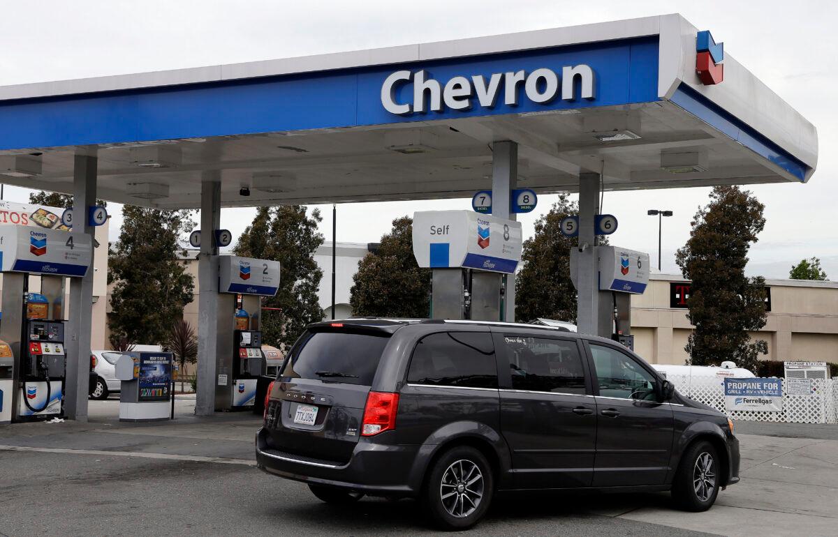 A motorist drives near the pumps at a Chevron gas station in Oakland, Calif., on April 25, 2017. (Ben Margot/AP Photo)