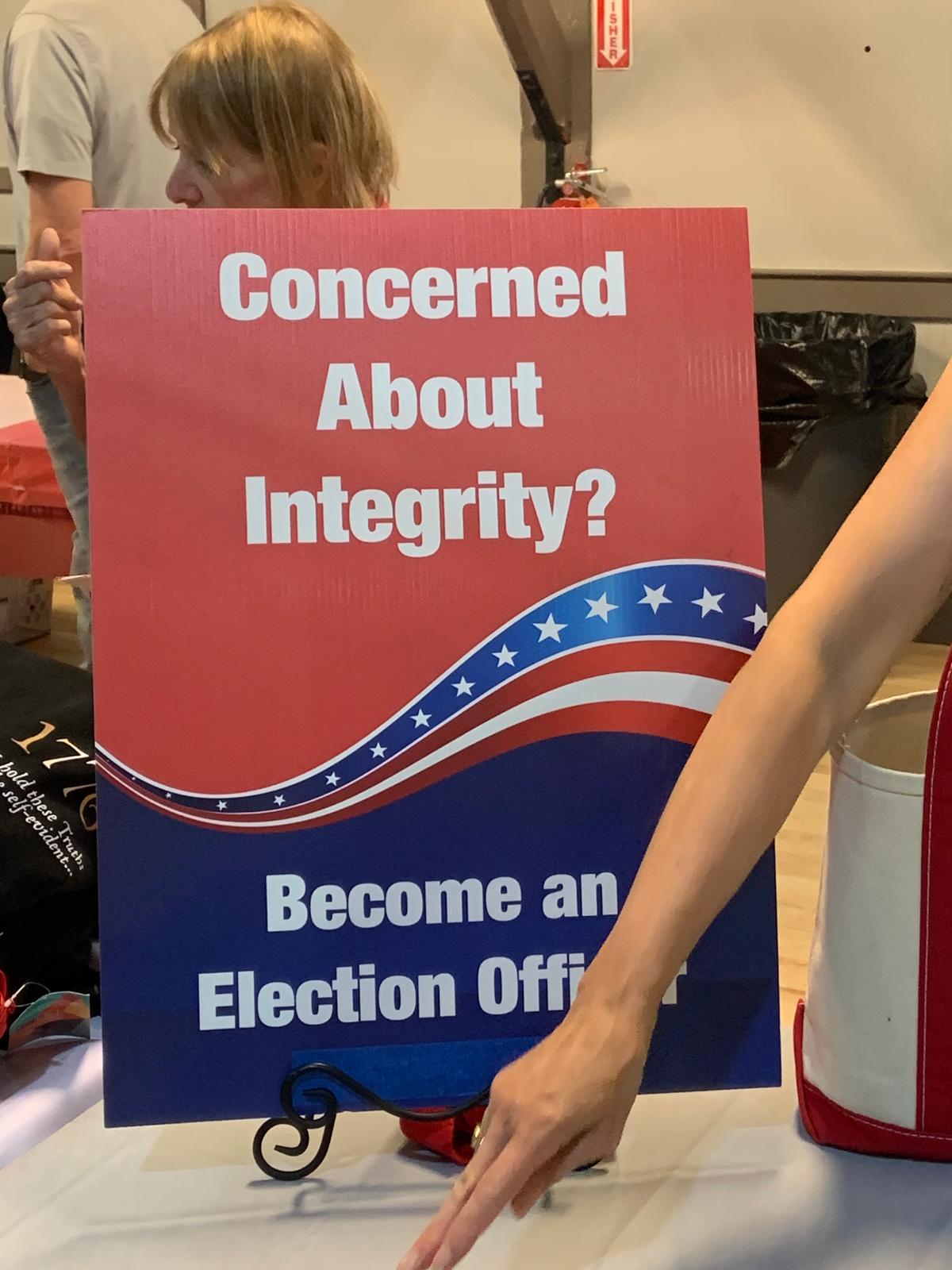 Sign used to recruit election integrity volunteers, at a Loudoun County Virginia Republican election event on June 8, 2023. (Masooma Haq/The Epoch Times)