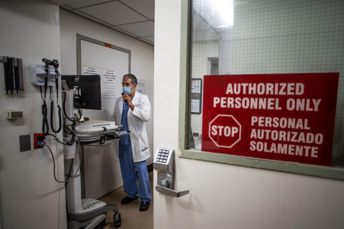 A doctor works at Dignity Health-St. Mary Medical Center, a Catholic hospital that allegedly provides puberty blockers for children and other transgender services, in Long Beach, Calif., on Dec. 17, 2020. (Apu Gomes/AFP via Getty Images)