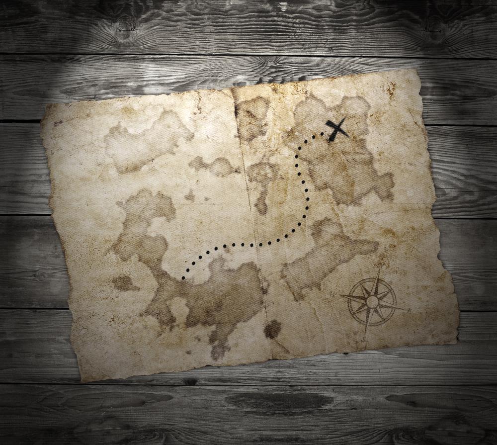 Perusing a treasure map can be a fun way to spend a rainy afternoon and may well lead to a memorable adventure.(Merydolla/Shutterstock)