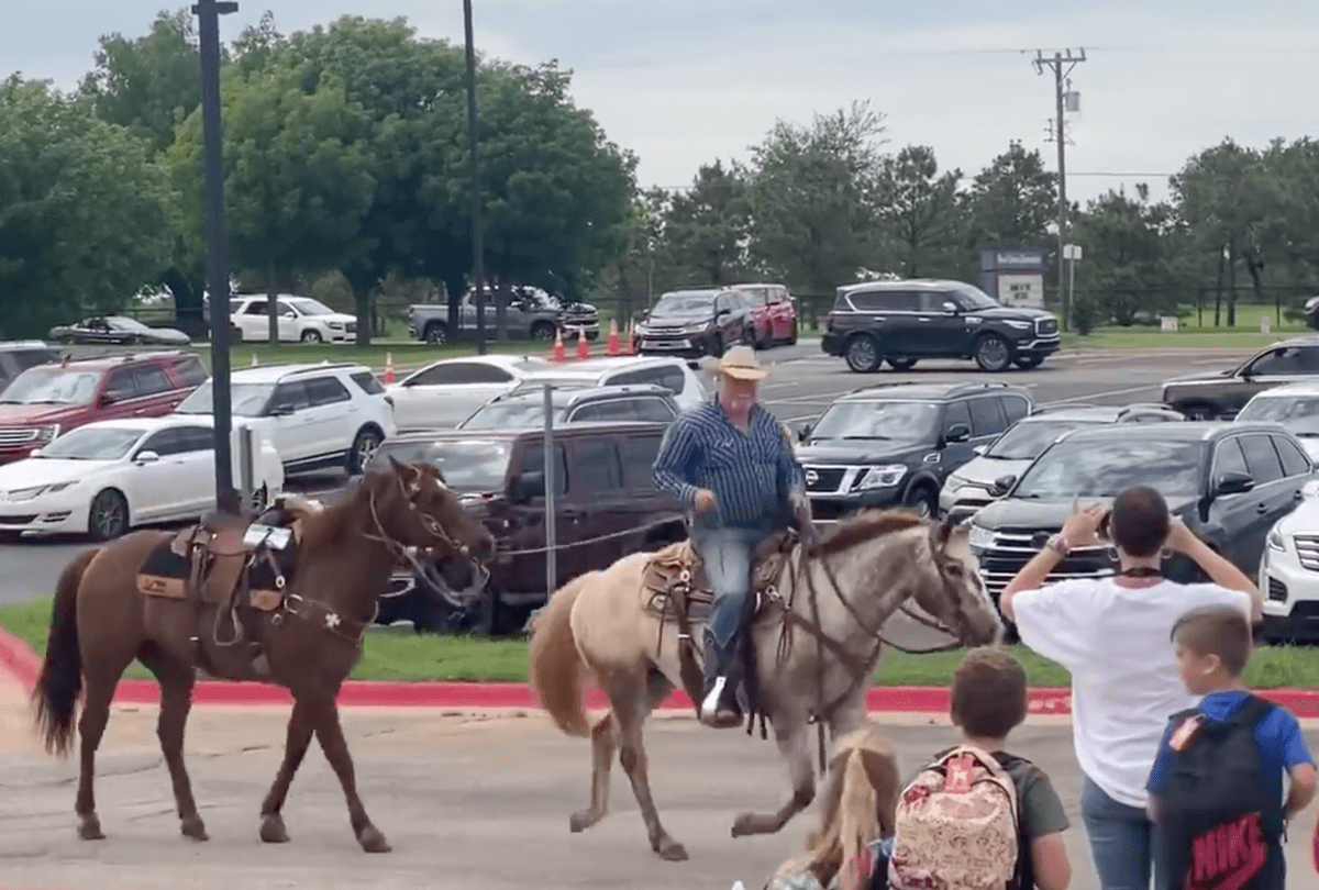 Mike Moorman on his way to pick up his son, Cale, on horseback. (Courtesy of Deer Creek School District)
