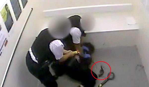 Screengrab from CCTV footage of Louis de Zoysa near a weapon (circled in red) in a holding cell at Croydon custody centre in London on Sep. 25, 2020. (Metropolitan Police)