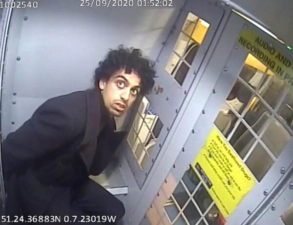 Screen grab taken from body worn camera footage of Louis De Zoysa being put into a police van in Norbury, south London on Sep. 25, 2020. (Metropolitan Police)