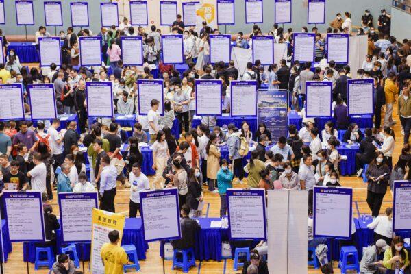 People attend a job fair in Huaian, in China's eastern Jiangsu Province, on May 26, 2023. (STR/AFP via Getty Images)