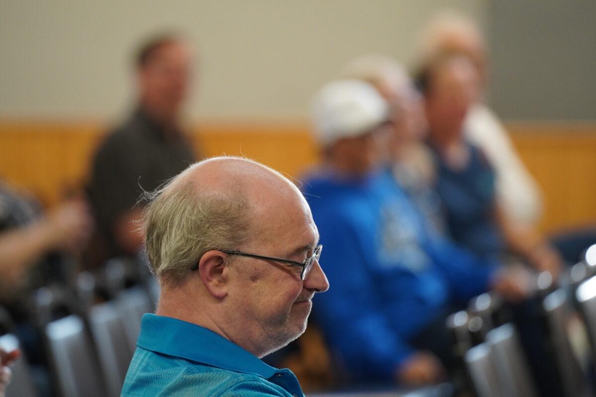 A landowner reacts at a gathering of farmers opposed to a CO2 pipeline in South Dakota on June 10, 2023. (Allan Stein/The Epoch Times)