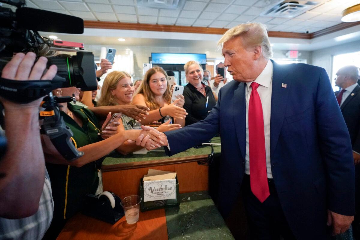 Former President Donald Trump greets supporters at Versailles restaurant in Miami on June 13, 2023. (Alex Brandon/AP Photo)