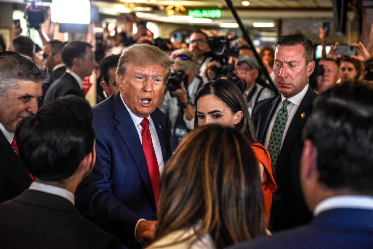 Former president Donald Trump visits the Versailles restaurant after being arraigned in Miami, Fla., on June 13, 2023. (Stephanie Keith/Getty Images)