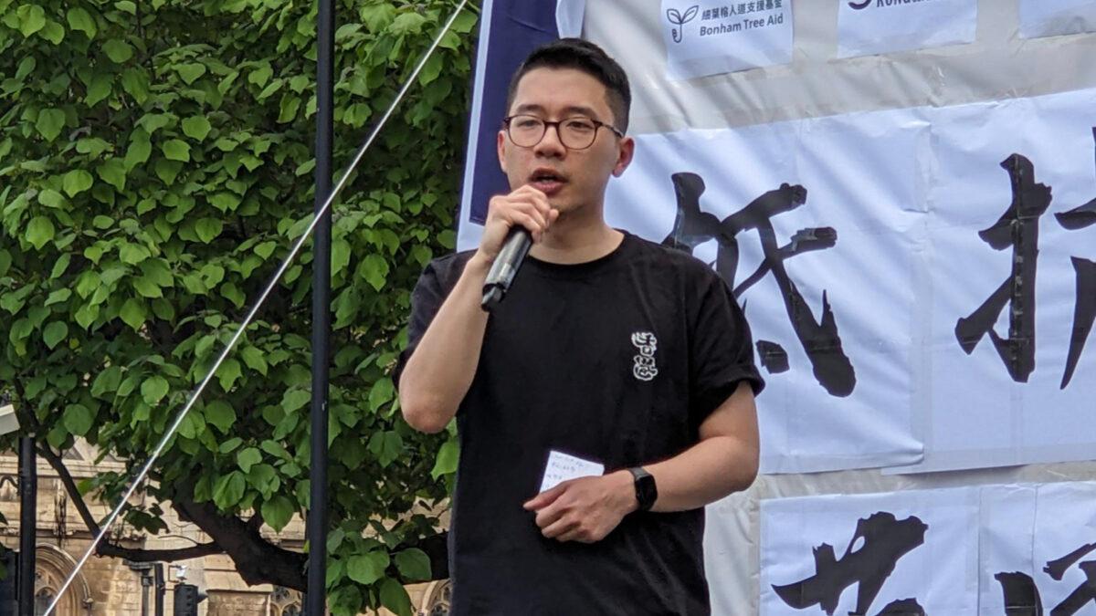 Former Hong Kong Legislative Council member Nathan Law spoke at a rally in London. (Shan Lam/The Epoch Times)