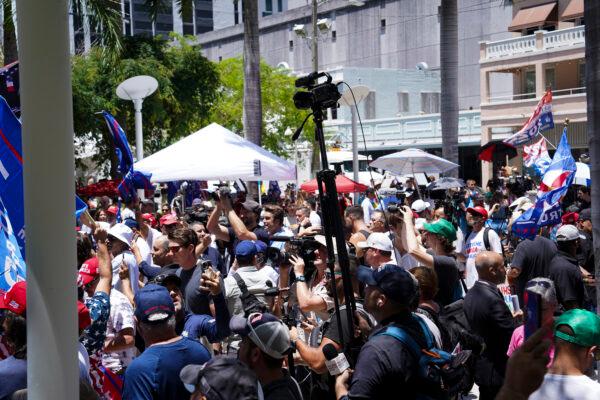 Protesters gather outside the Wilkie D. Ferguson, Jr. federal courthouse, awaiting the arrival of former president Donald Trump in Miami, Fla., on June 13, 2023. (Madalina Vasiliu/The Epoch Times)