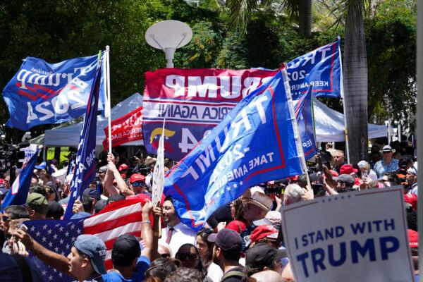 Protesters gather outside the Wilkie D. Ferguson, Jr. federal courthouse, awaiting the arrival of former President Donald Trump in Miami, Fla., on June 13, 2023. (Madalina Vasiliu/The Epoch Times)