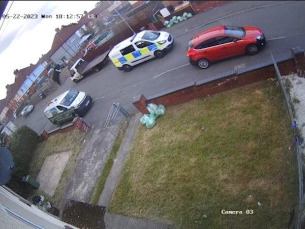 Screenshot taken from private CCTV footage which appears to show a police van on Howell following two teenagers on an electric bike in Ely, Cardiff, on May 22, 2023. (Handout/PA)