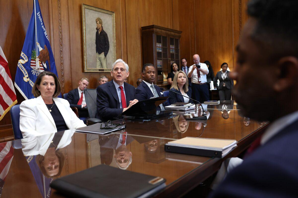 U.S. Attorney General Merrick Garland, second from left, answers questions during a meeting with U.S. attorneys at the Justice Department in Washington on June 14, 2023. Garland was joined (from left) by Deputy Attorney General Lisa Monaco, Assistant Attorney General Kenneth Polite, and U.S. Attorney Jessica Aber for the Eastern District of Virginia. (Kevin Dietsch/Getty Images)