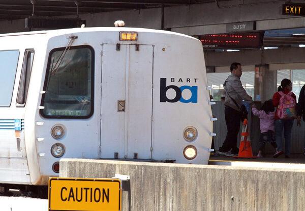 Passengers get off of a Bay Area Rapid Transit (BART) train as it arrives at the Daly City station in Daly City, Calif., on Aug. 15, 2011. (Justin Sullivan/Getty Images)