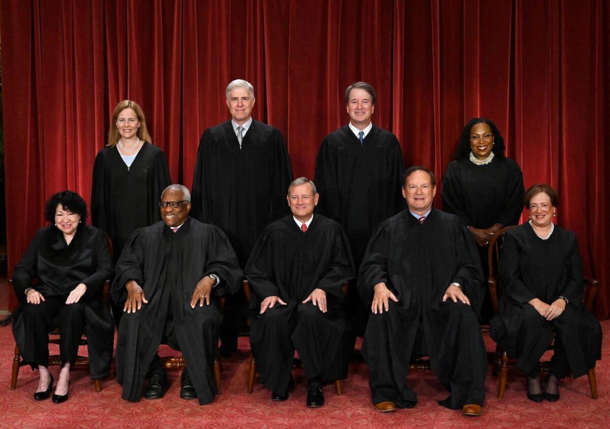 Justices of the US Supreme Court pose for their official photo at the Supreme Court in Washington on Oct. 7, 2022. (Seated from left) Associate Justice Sonia Sotomayor, Associate Justice Clarence Thomas, Chief Justice John Roberts, Associate Justice Samuel Alito and Associate Justice Elena Kagan, (Standing behind from left) Associate Justice Amy Coney Barrett, Associate Justice Neil Gorsuch, Associate Justice Brett Kavanaugh and Associate Justice Ketanji Brown Jackson. (Olivier Douliery/AFP via Getty Images)