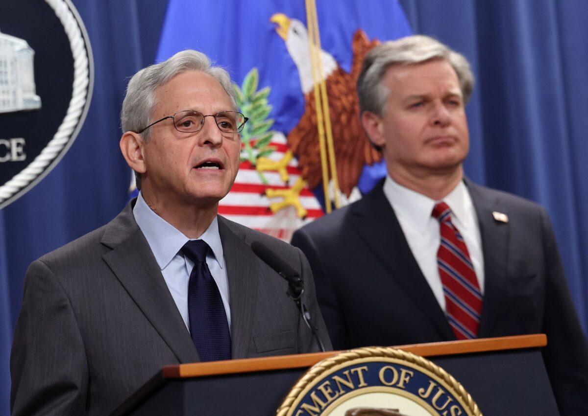 U.S. Attorney General Merrick Garland (L) and FBI Director Christopher Wray hold a press conference at the U.S. Department of Justice in Washington on Oct. 24, 2022. (Kevin Dietsch/Getty Images)