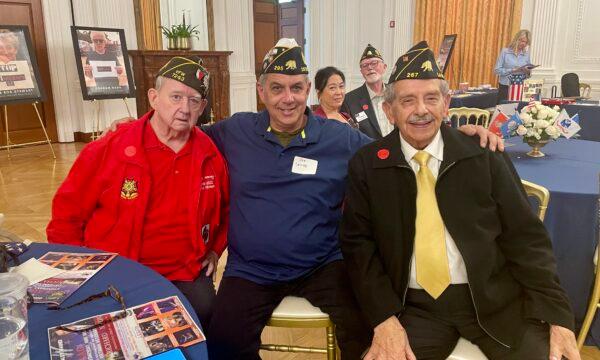 (L-R) Vietnam War veterans Steven Kemp, Joe Castillo, and Albert Ruiz sit together at the Angel Force USA Flag Day event "Stop Suisilence" at Nixon Library at the Nixon Library and Museum in Yorba Linda, Calif., on June 14, 2023. (Carol Cassis/The Epoch Times)