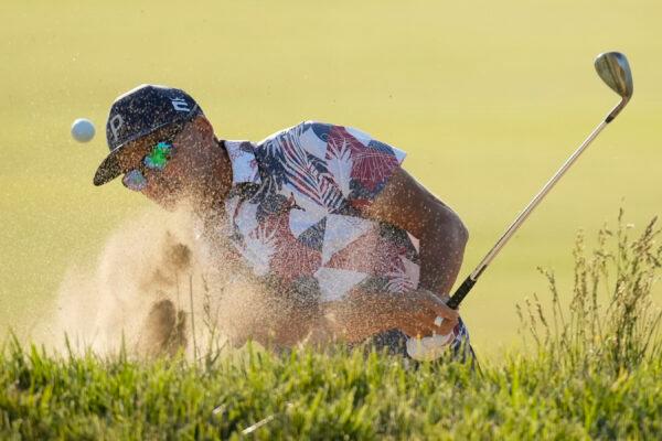 Rickie Fowler hits from the bunker on the 16th hole during the second round of the U.S. Open golf tournament at Los Angeles Country Club in Los Angeles on June 16, 2023. (Marcio J. Sanchez/AP Photo)